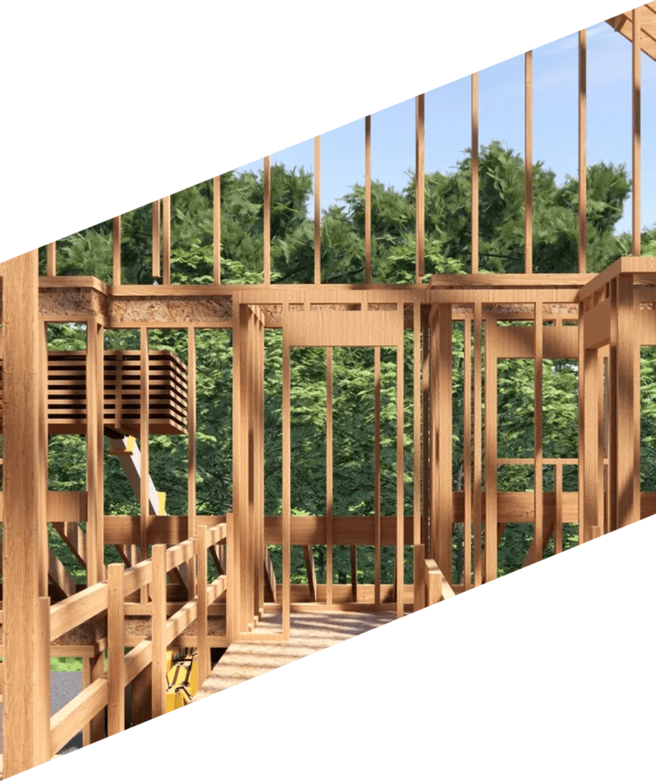 Wooden house under construction with a staircase up to the second floor, surrounded by trees